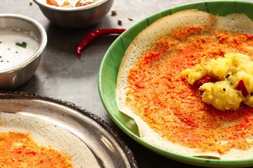 Mysore Masala Dosa served with sambar and chutney, selective focus