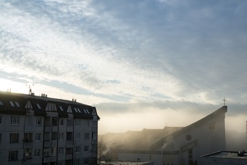 Fototapeta premium Sunrise and sunset over the buildings in the Zilina city. Slovakia