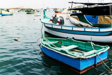 Fototapeta premium Mediterranean traditional colorful boats in Malta