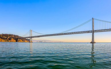 Fototapeta na wymiar Oakland Bay Bridge in the evening, San Francisco