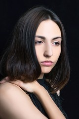 portrait of brunette in black dress