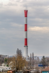 Fototapeta na wymiar Belgrade, Serbia Marth 03, 2016: A big factory chimney