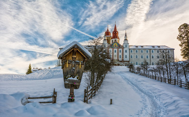 Monastery of Pietralba near Monte San Pietro, Nova Ponente, South Tyrol, Italy. The most important sanctuary of South Tyrol. Winter view with snow.
