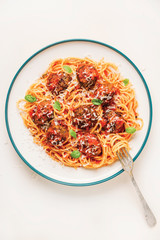 Spaghetti with meatballs and eggplants