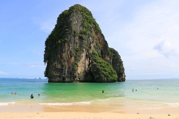 Fototapeta na wymiar Phra Nang beach, Thailand, July 2017. The famous tropical beach with the typical rocks formation that characterize krabi province.