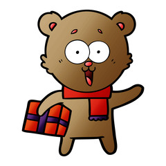 laughing teddy  bear with christmas present