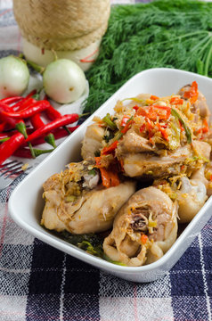 Spicy steamed chicken with herbs. Thai food concept.