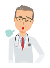 Fototapeta premium A middle-aged male doctor wearing a white suit is sighing