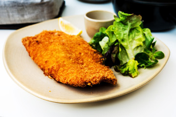 wiener schnitzel, veal cutlet and lemon, austrian cuisine