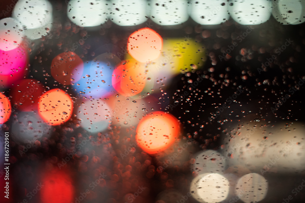 Fototapete Abstract blur of light in the night with rain background