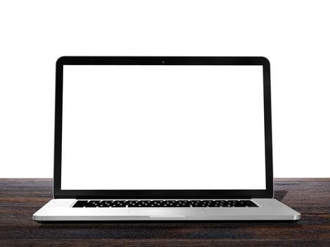 Laptop with blank white screen on wooden table 