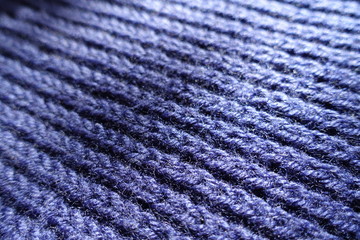 Fototapeta na wymiar Thick dark purple handmade rib knit fabric