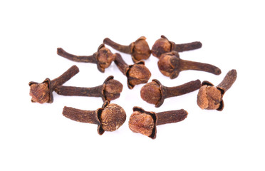 dry cloves on white background