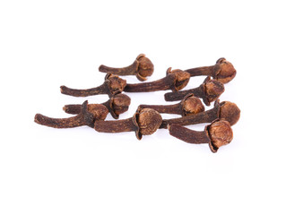 dry cloves on white background