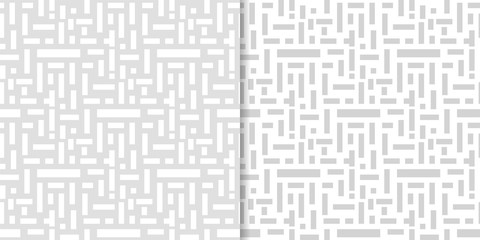 Light gray geometric ornaments. Set of seamless patterns