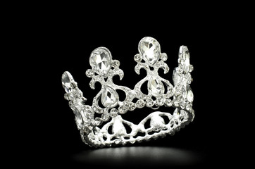silver crown isolated in black background
