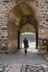 Woman under archway