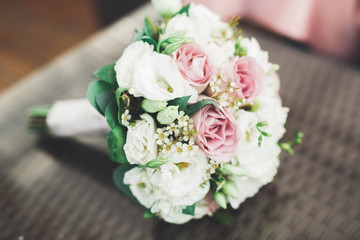 Beautiful wedding bouquet with different flowers, roses