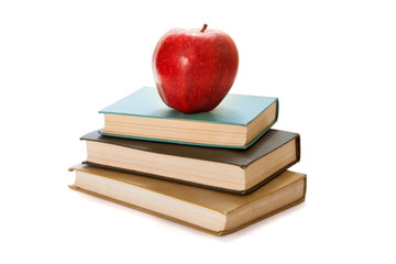 Red apple on books. White background