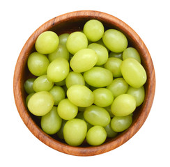 Green  Grapes in a wood bowl isolated on a white background