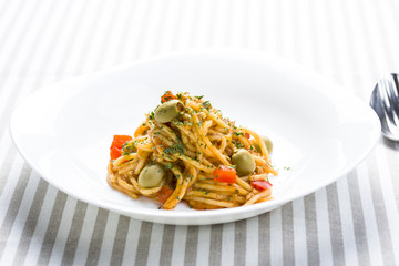 spaghetti bolognese with olives