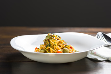 spaghetti bolognese with olives