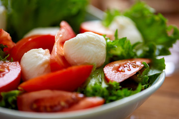 close up of vegetable salad with mozzarella