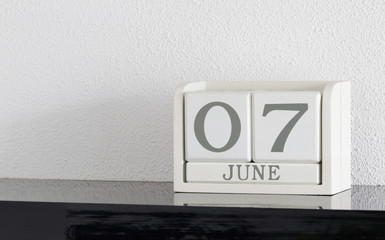 White block calendar present date 7 and month June