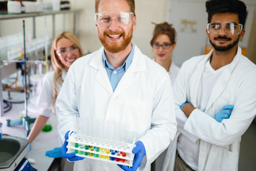 Group of scientists working at laboratory