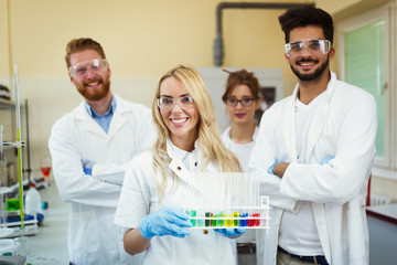 Group of scientists working at laboratory