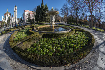 Fish-eye view 180 of a fountain in the Retiro park in Madrid city