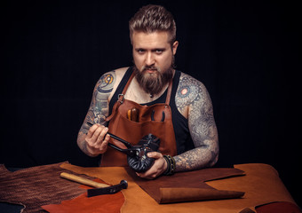 Shoemaker makes artisan shoes with old tools