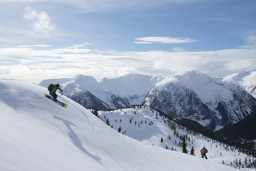 Fototapeta na wymiar Young man skiing in the mountains