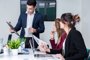 Man and women doing paperwork