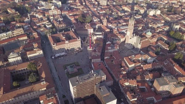 Monza's duomo (cathedral) aerial view from drone in 4k. Italian city ​​landscape with walking people 