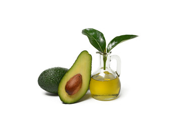 avocado oil with fruits around - isolated on white background