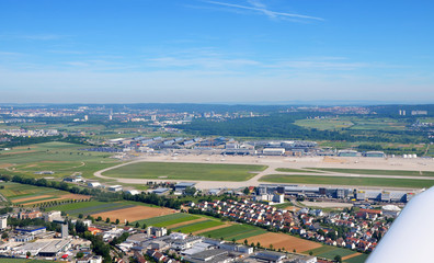 Fototapeta na wymiar Aerial view of Stuttgart area with Stuttgart Airport (STR) on a sunny day