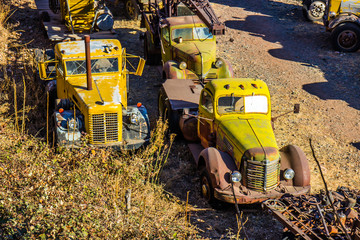 Vintage Large Trucks In Salvage Yard
