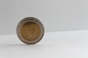 One euro coin on isolated white background Denomination is two euro - back side