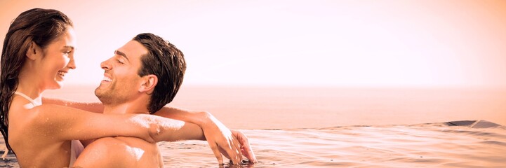 Couple embracing in the pool