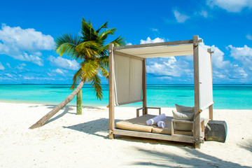 Chill lounge zone on the sandy beach, Maldives island