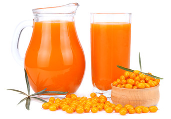 Sea buckthorn juice in glass isolated on white background