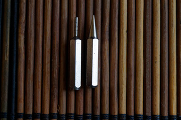Head for screwdriver (bits) on wooden background, Tools collection turn-screw
