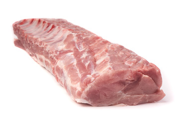 Fresh raw pork loin with ribs, isolated on white background.