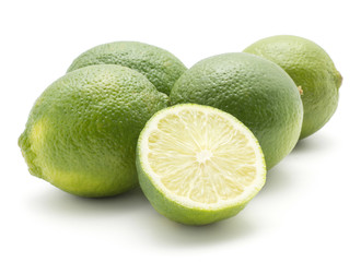 Limes four whole one half isolated on white background.