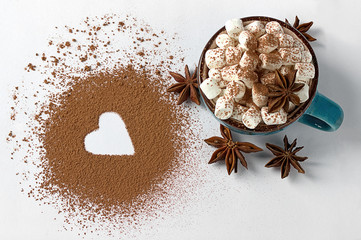 Valentine day backround marshmellow, blue cup coffee cocoa powder star anis.