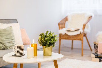 Coffee table and wicker chair