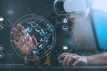 businessman wearing virtual reality goggles in modern office with Smartphone using with VR headset with scanning data screen icon diagram