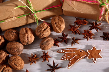 Gingerbread star poured white frosting on Christmas Eve table in a Christmas surprise for guests.
