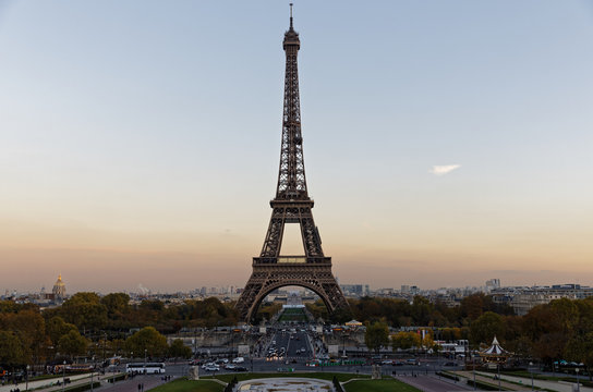 PARIS - FRANCE, NOVEMBER 7, 2017: Eiffel Tower from Trocadero Square at dusk. The Eiffel tower is the most visited monument of France